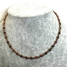 M&S glass tigers eye bead