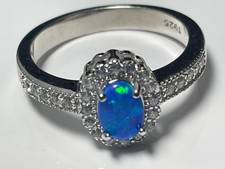 Sterling silver '925' and fire opal and clear stone cluster ring band size O