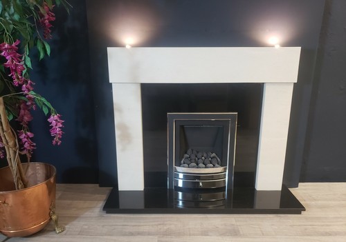 Limestone fireplace with black - limestone,