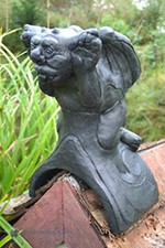 Cheeky Tongue gargoyle roof finial half round decorative stone ridge tile
