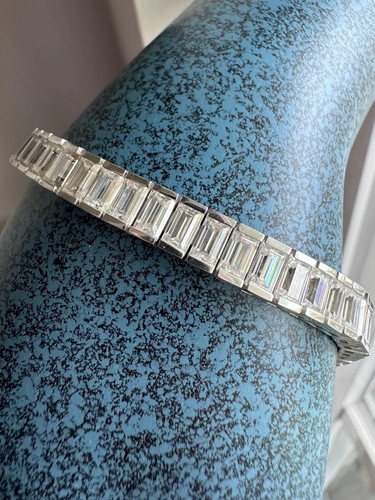 Emerald cut bezel set - 29, ct