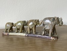 Graduated set of  4 onyx marble stone elephant figurine on a base 