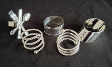 Five different old silver plate napkin rings.  Free P&P