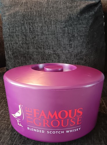 The famous grouse scotch - the,