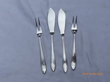2 SILVER PLATE BUTTER KNIVES & 2 SNAIL SEAFOOD PICKLE FORKS?
