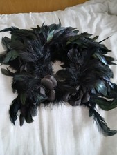 gorgeous feather and flower gothic head dress by Deltou Couture