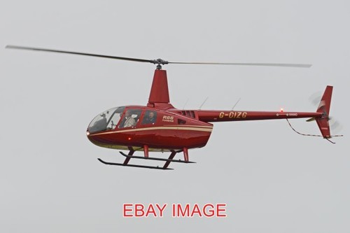 Photo helicopter robinson r66 - ,