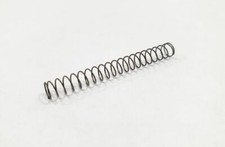 Freewheel piston spring