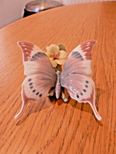A LOVELY  LLADRO 6173 "A MOMENTS REST " BUTTERFLY FIGURE .