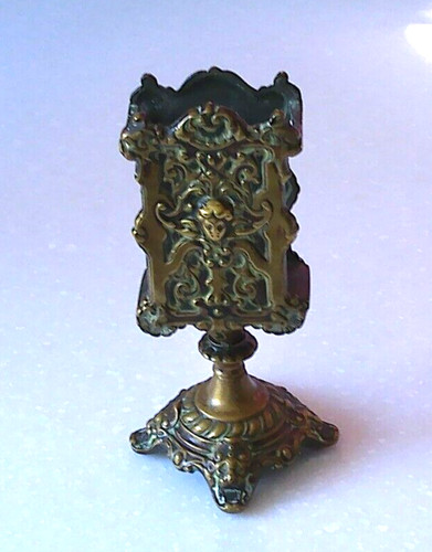 Antique ornate bronze match - ornate,