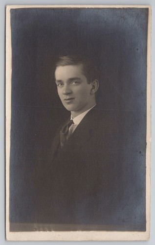 Young man portrait dark suit - man,