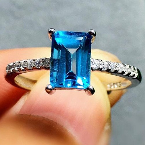 Emerald cut 30ct blue topaz - blue,