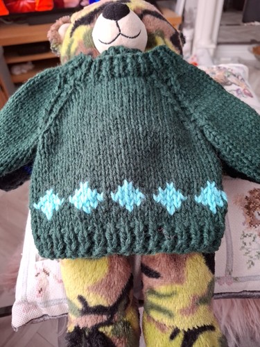Hand knitted teddy bear - hand,