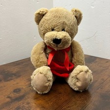 Clintons Teddy Bear with Red Christmas Bag