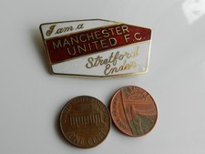 A VINTAGE ENAMEL FOOTBALL BADGE, I AM a MANCHESTER UNITED F.C. STRETFORD ENDER.