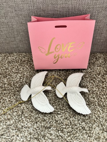 Two turtle doves - two, with