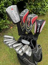 NICE SET OF MENS RIGHT HANDED ADAMS GOLF CLUBS IN A POWAKADDY CART BAG