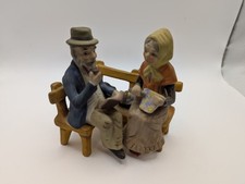 Elderly Couple on Park Bench