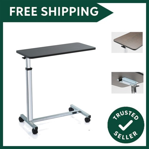 Over bed table with - , castors