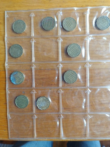 Three penny coins thru - three,