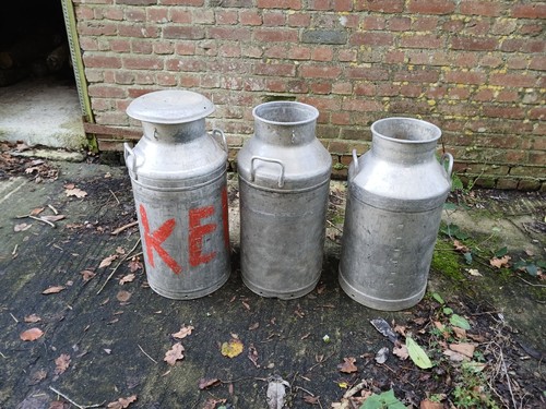 Three vintage aluminium milk - three,