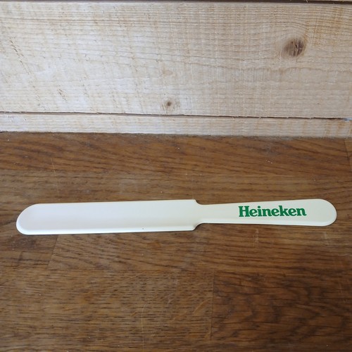 Heineken beer lager foam - foam, knife