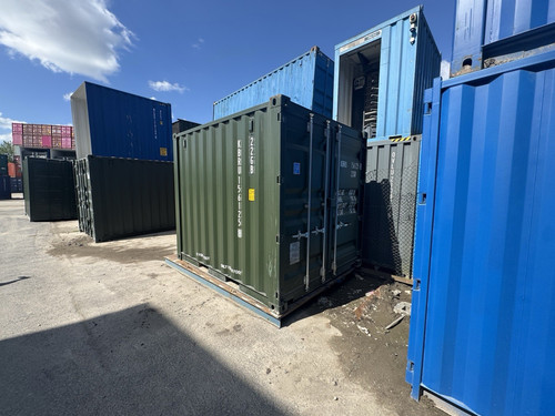 Green metal shipping container - green,