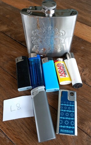 Vintage lighters and hip - lighters.,