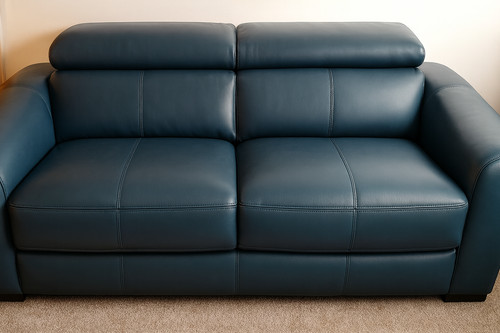 Leather three seater - sofa, bed