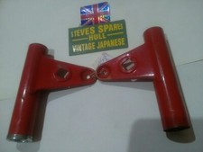 SUZUKI ZR50 X1 ,HEADLAMP BRACKETS RED PAIR ,GENUINE  , preowned ,NLA ,No 2 pair.