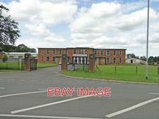 PHOTO  EX RAF WATTON FORMER AIRMEN'S MESS NOW TRADING AS MR READ'S CARPET CENTRE