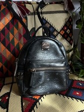 MCM Mini Backpack Black with Side Studs in Visetos Pattern 