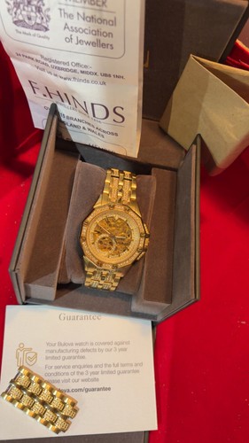 Bulova gold and - gold, dimond