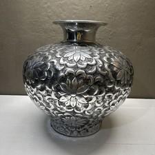 Hammered Metal Floral Motif