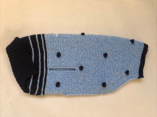 Hand knitted blue dog - hand,
