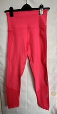 Lorna Jane leggings size XS fits  XS-S with side pockets and mesh pink