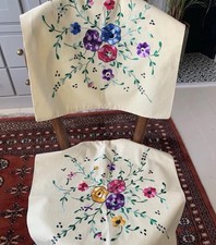 Pair of hand-embroidered