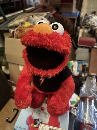 Hasbro let rock elmo - hasbro,