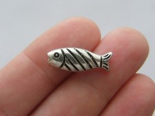8 Fish spacer beads antique