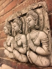 Stone buddha wall plaque