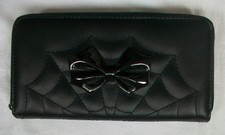 Banned black bat bow web purse