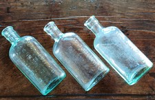 3 VINTAGE BOTTLES Glass