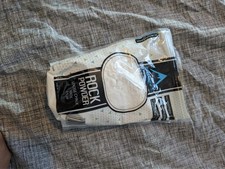 rock powder chalk and two chalk balls 