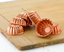 vintage coppered aluminium individual fluted jelly moulds - late 1900's