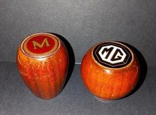 2 Vintage MG And Morris? Wood And Enamel And Wood And Plastic Gear Knobs.