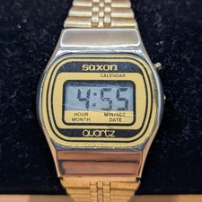 Vintage Saxon gold tone