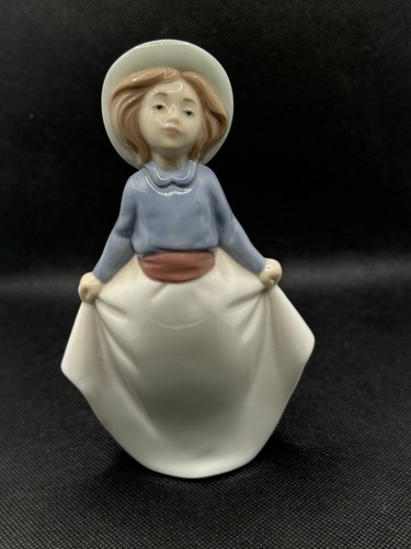Nao lladro little girl - by,