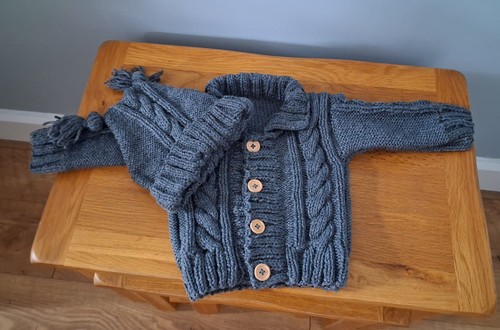 Hand knitted aran - hand,
