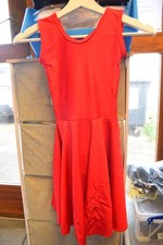 Red sleeveless ballroom dance