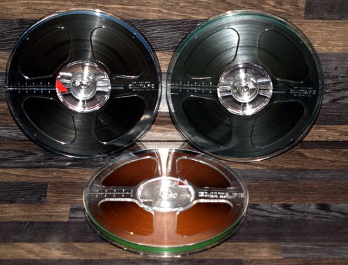 Three used 3 4 - reel, tapes